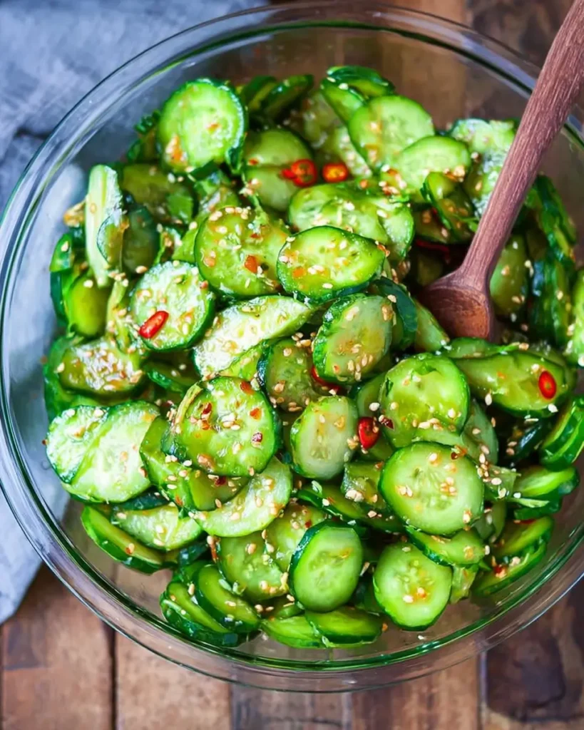 Easy Asian cucumber salad with sesame seeds, chili flakes, and sliced cucumbers