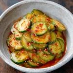 Oi Muchim Korean cucumber salad with spicy chili dressing and sesame seeds